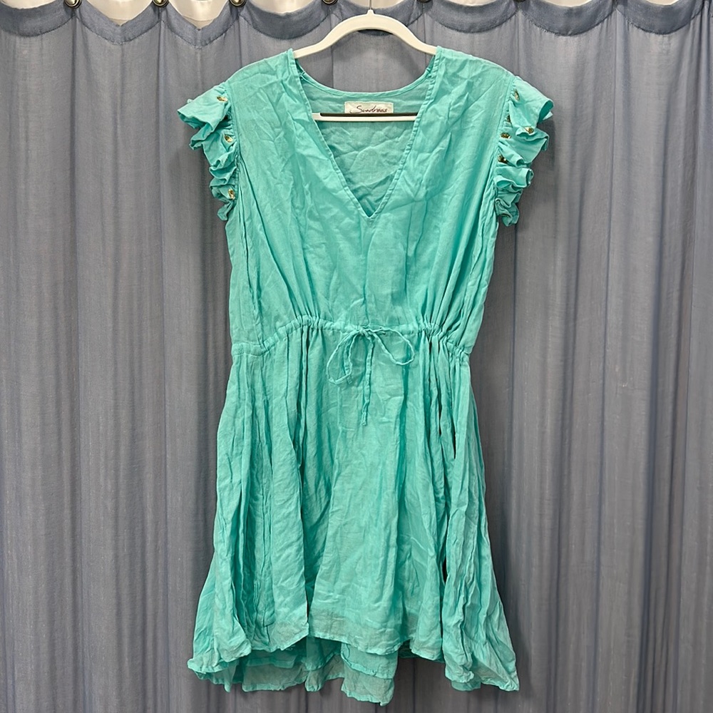 Flowy dress with gold sequence polka dots on sleeve